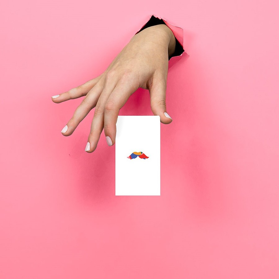 Mini Full-Color shown in-hand at 2" × 3.5" scale