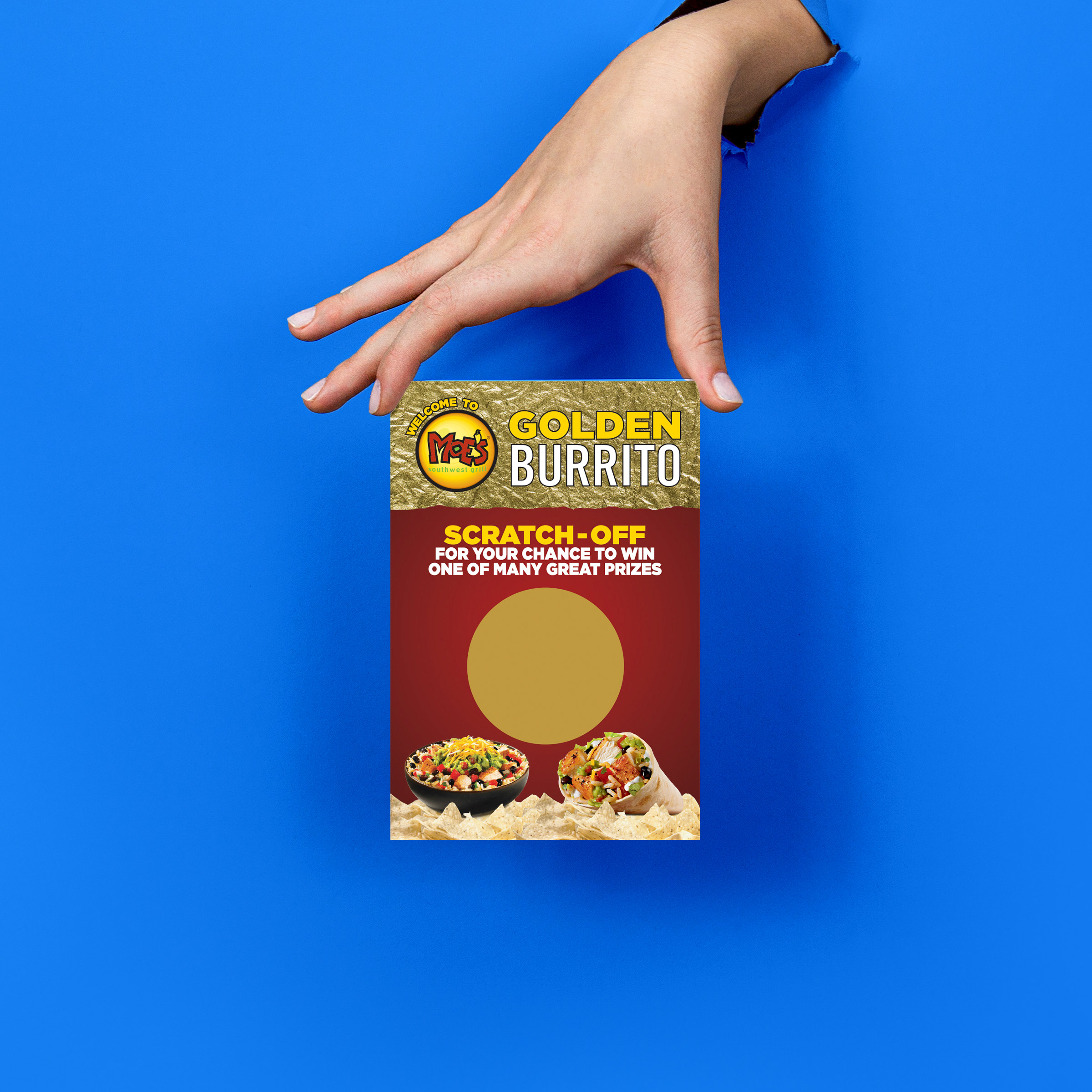 Hand scratching the latex panel off a custom promotional card