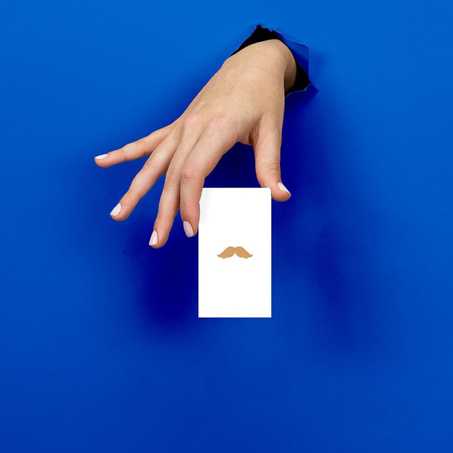 Mini Classic shown in-hand at 2" × 3.5" scale